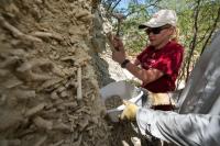 Researchers collecting bulk sediment samples